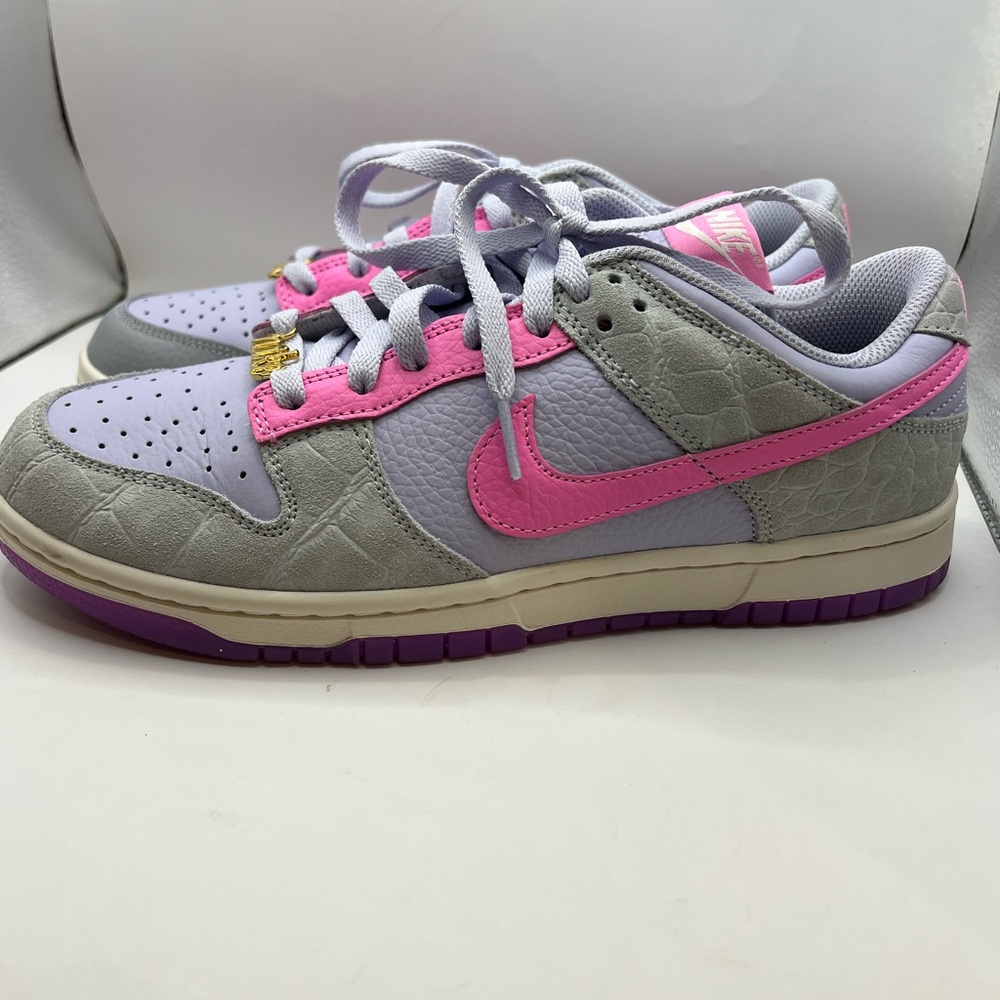 Nike Pink and Gray Sneakers with Classic Low-Top Design